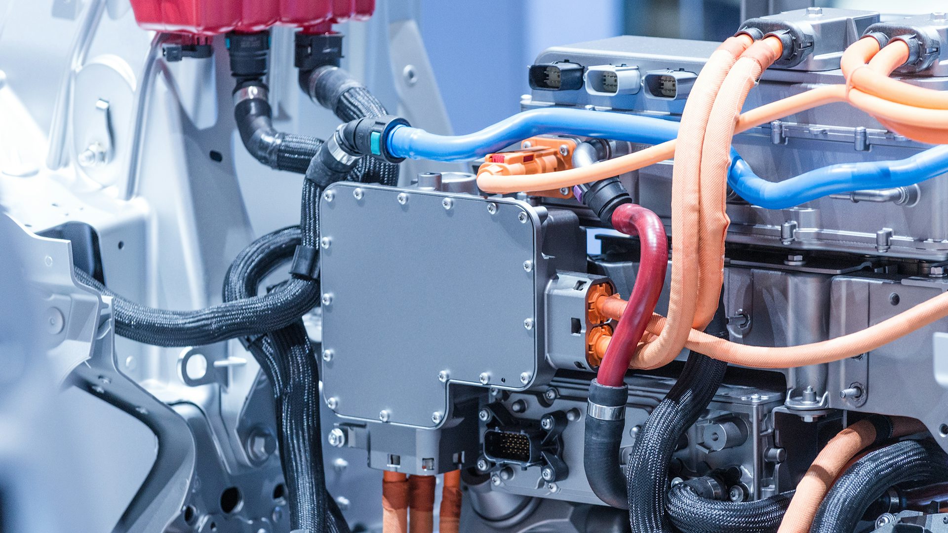 A closeup of an automotive electrical system created with the assistance of electrical design.