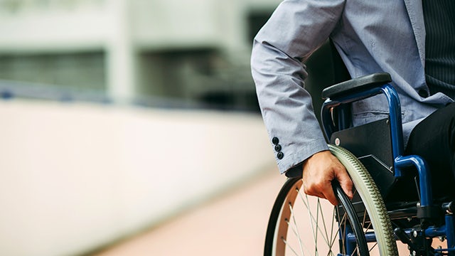  Man in wheelchair representing Siemens Ability and support