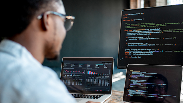 Engineer debugging software.