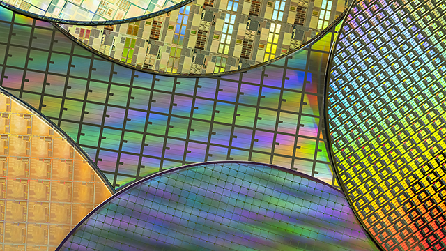 silicon wafer reflecting different colors.