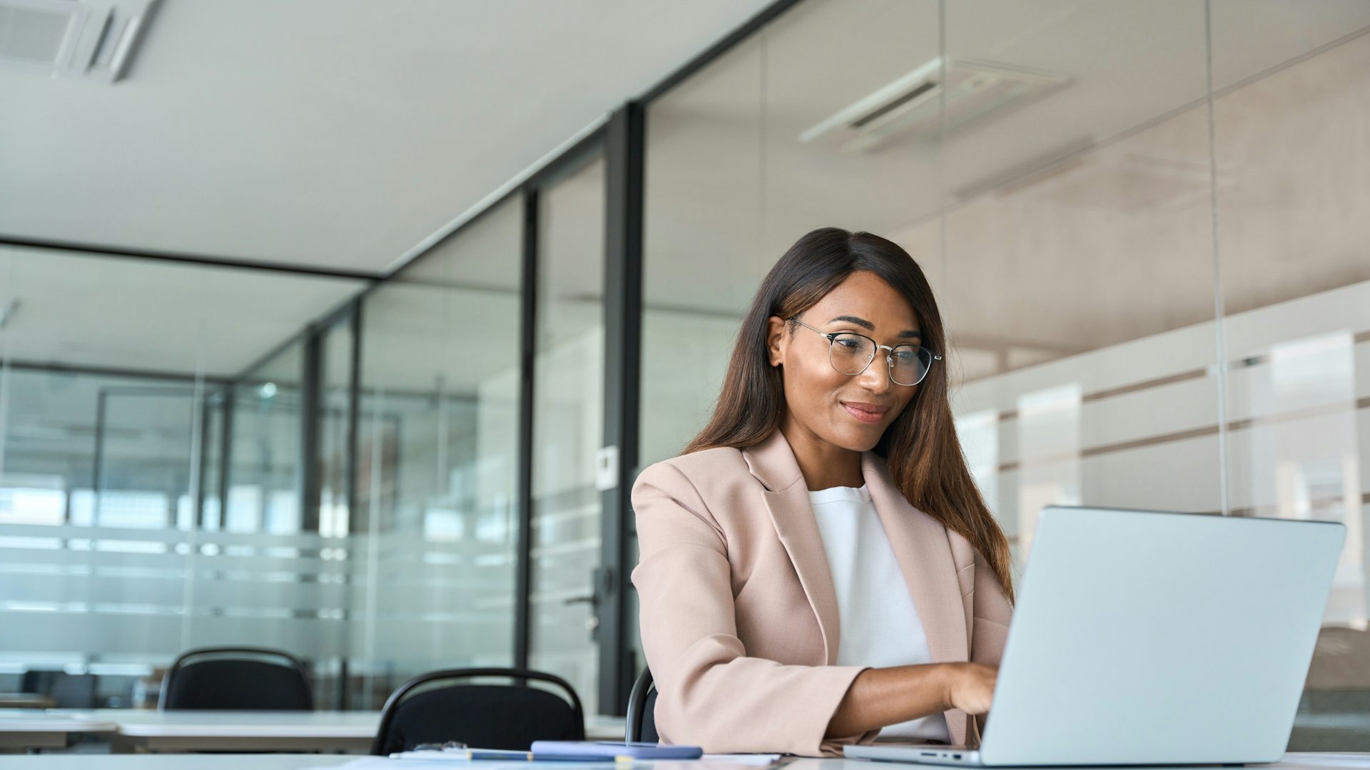 Woman working at a computer.