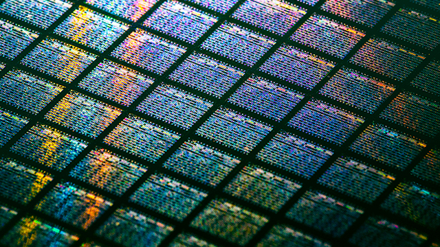 Close-up of chips on a wafer.