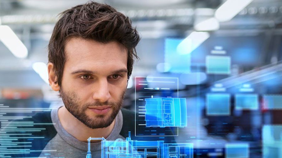 Medical device engineers discussing data and collaborating on the design of a new prosthetic leg and to enhance its potential