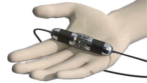 Simcenter exciters low-frequency miniature device in a hand.
