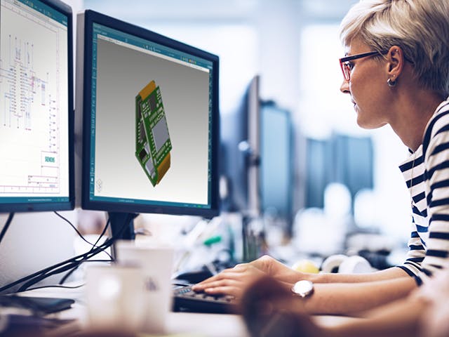 An engineer working on a rigid-flex PCB design using Xpedition Standard.