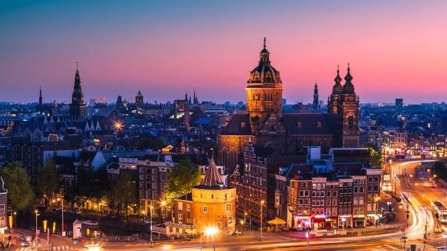 Evening aerial view of Amsterdam, Netherlands.