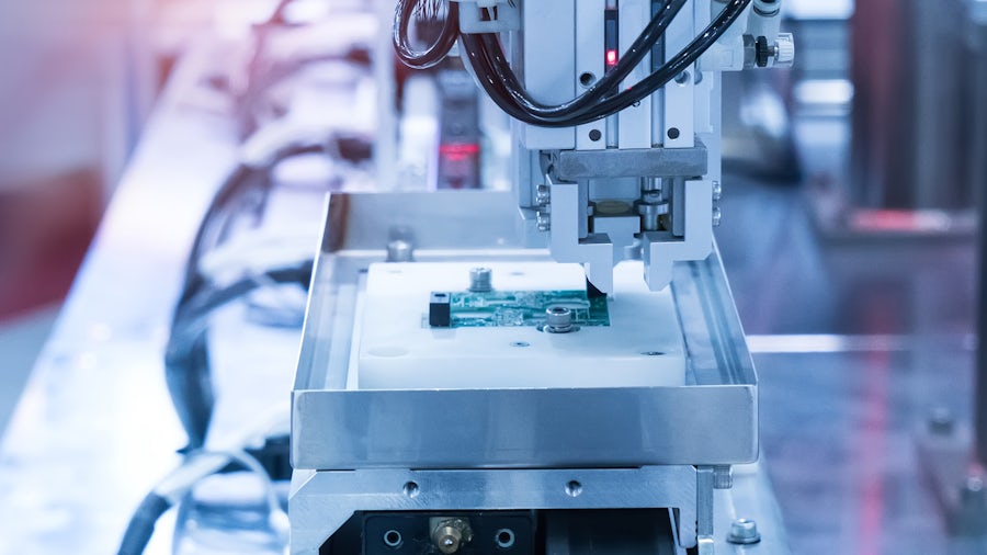 SMT machine being used in electronics manufacturing