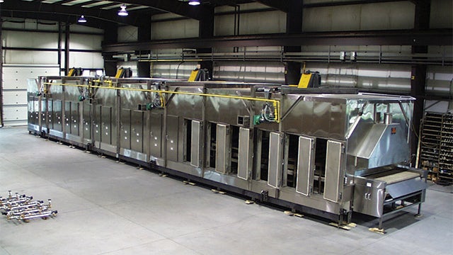 Food moves from left to right in this pita chip snack dryer.