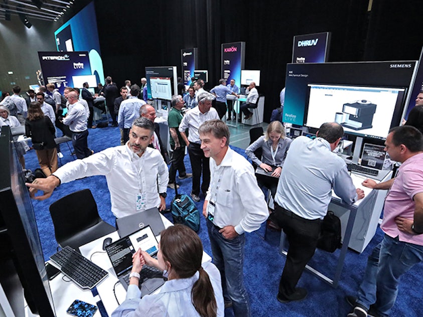 Attendees visiting the Solutions Center at Realize Live Europe.