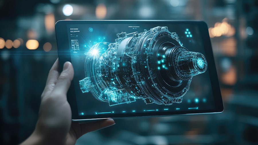機械式エンジンのホログラムを映したタブレットを持つ手。工場の工業設計およびエンジニアリングのためのデジタルツイン技術