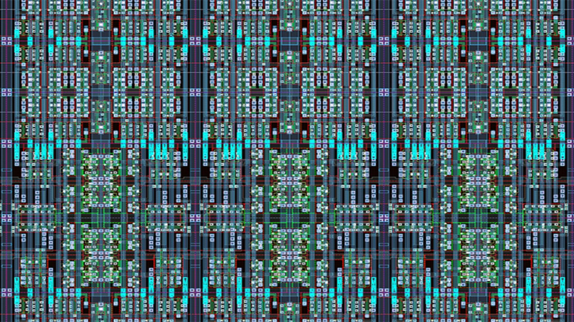 A magnified section of a silicon chip component layout.