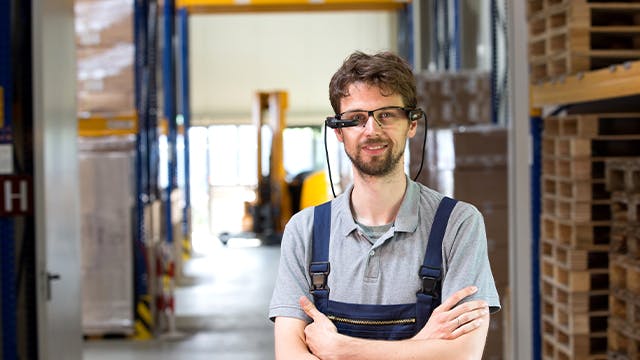Man working in a factory and welding