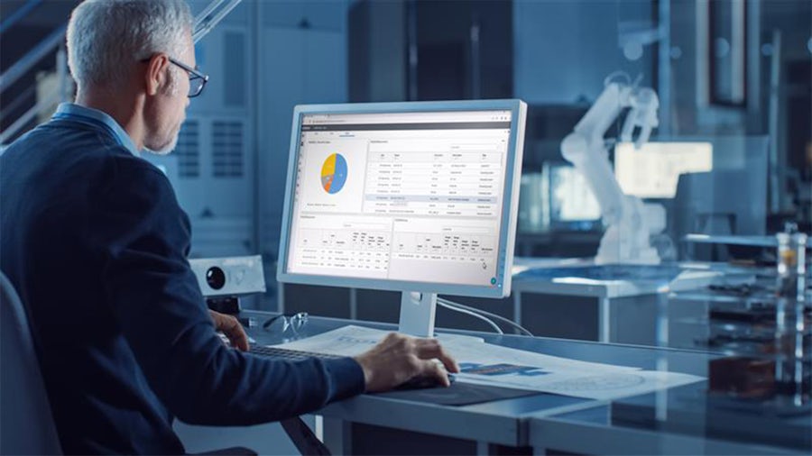 An engineering sitting at a computer.