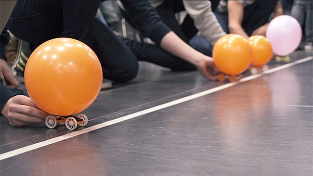 In the first semester CAD course, students designed, built and raced balloon-powered model cars using NX for design work.