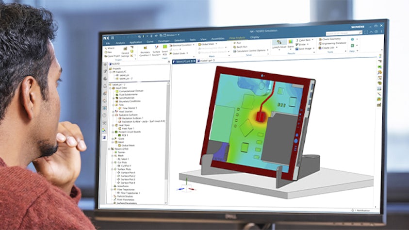 Image of person looking at Simcenter FLOEFD 2406 CAD embedded CFD software version operating on a desktop monitor screen.