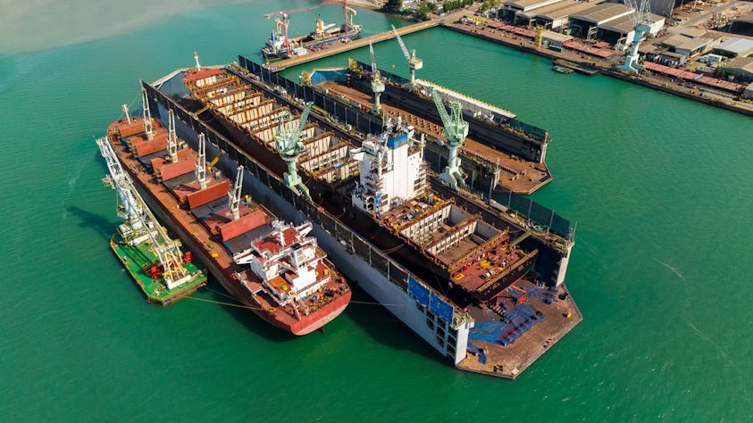 multiple cargo ships in shipyard
