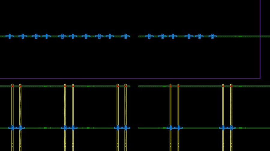 An IC layout with vias highlighted in different colors. The blue vias were placed by the floorplanning tool; the additional red vias were added by Calibre DesignEnhancer to enhance the power delivery network and reduce IR drop in the design.