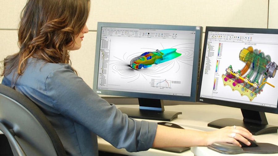 Woman looking at simcenter floefd for ptc creo screens