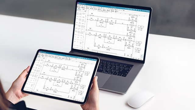 An electrical tablet and laptop displaying Capital X Panel Designer software.