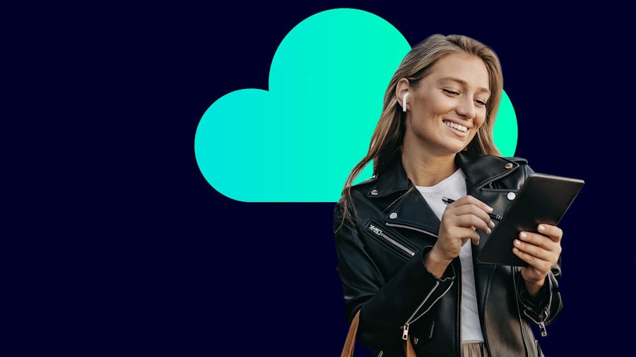 A woman works on a digital tablet with a graphic depiction of a cloud behind her.