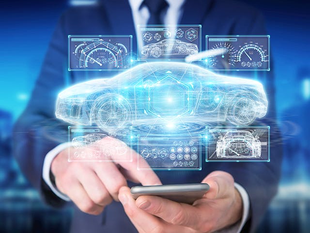 man holding phone projecting virtual car schematic and dashboard display | The Calibre RealTime Digital interface provides on-demand Calibre sign-off DRC for digital design flows, enabling engineers to meet PPA goals in less time.