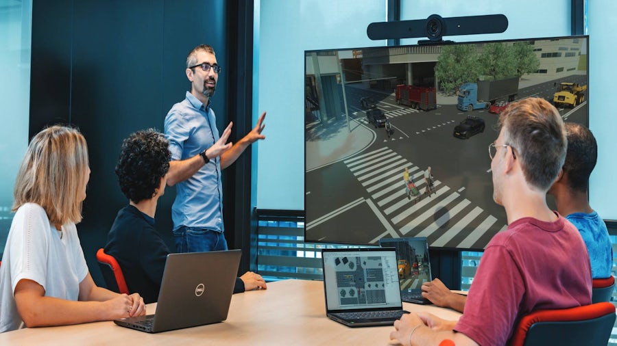 A team of engineers having a meeting discussing AV.