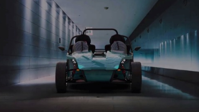 An open-top buggy in a corridor