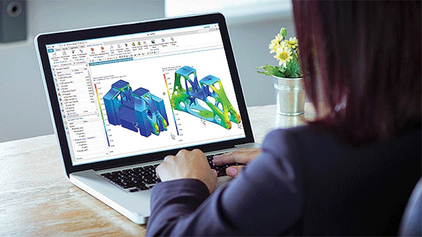 コンピューターで3Dビルド・シミュレーションを作成する女性の画像