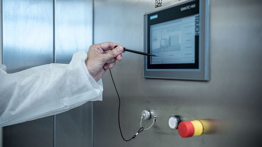 A scientist uses a digital pencil as part of critical environment technology.