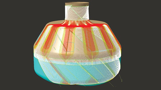 Pictured is a producibility simulation of the NASA composite crew module created using Fibersim. The white fibers indicate areas that fall within specification, while the yellow areas indicate mild deviation and the red areas indicate areas of significant deviation from specification. Fibersim enables users to understand what areas will present manufacturability issues prior to reaching the shop floor, saving a significant amount of time and resources. 