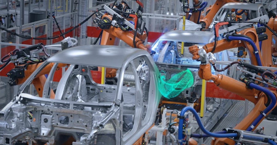An electric vehicle’s functional safety software being updated over the air while it is driving on the road.