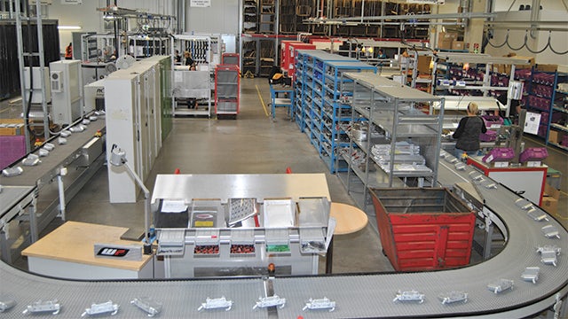 Separating the A parts from the lower quantity varieties and building them in a cyclic flow production along a U-shaped conveyor allowed WP Components to increase output by 40 percent without requiring more room or extra workers.