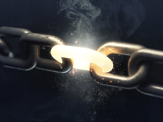 An image of links being forged in a chain.